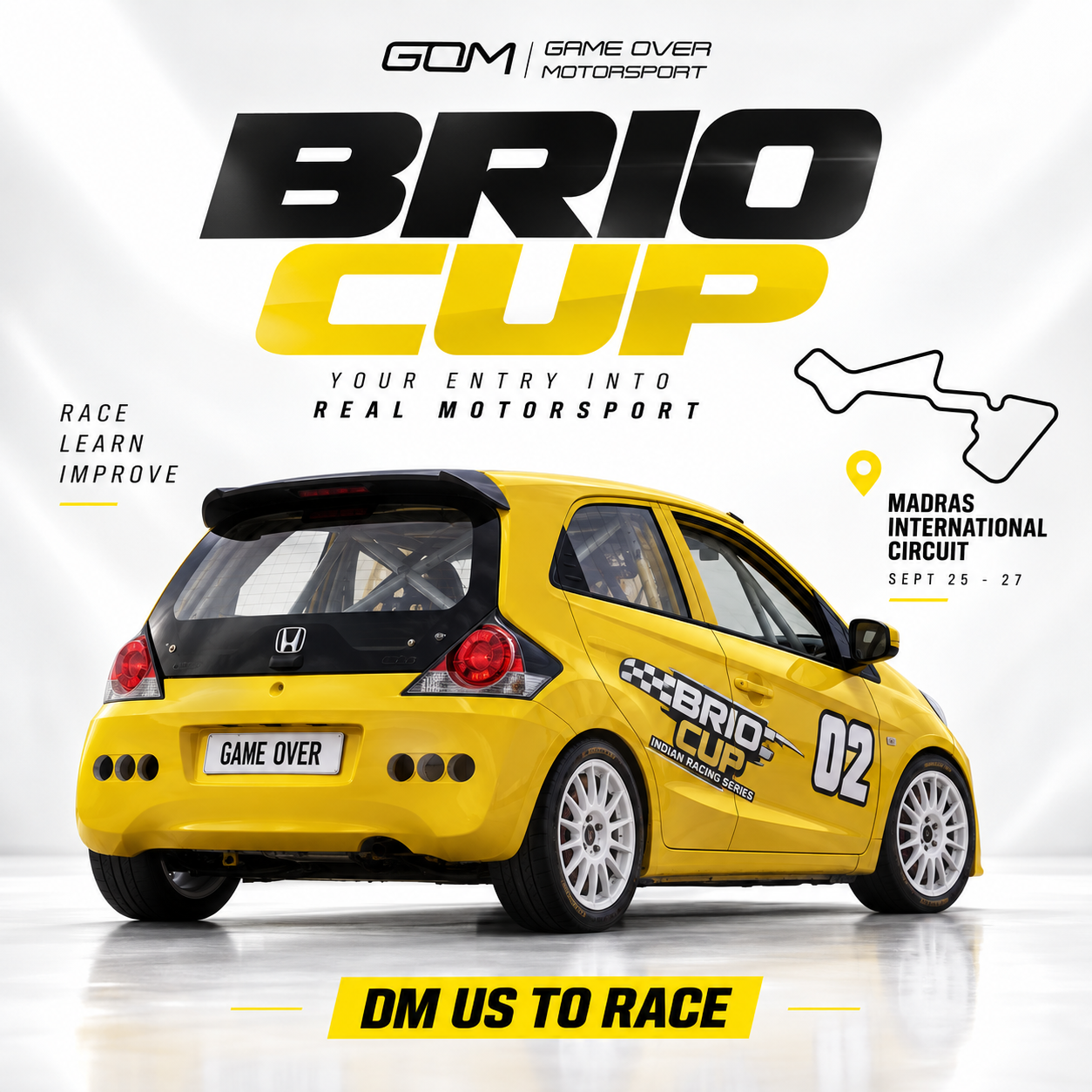 Rear view of the yellow Brio Cup race car with Madras International Circuit details